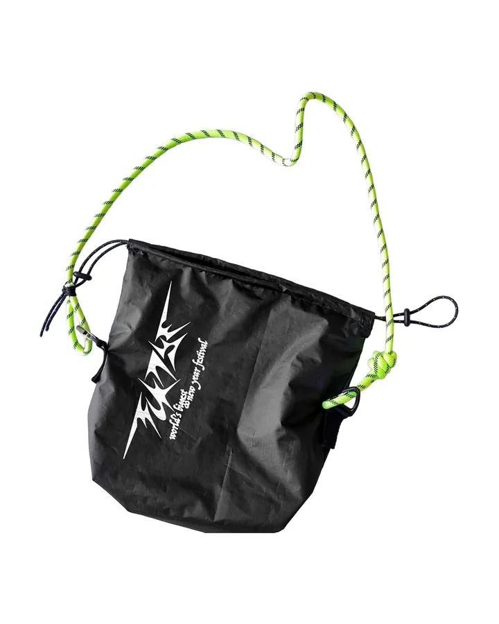 Black drawstring bag with a lime green cord and the FCKNYE Festival logo in white